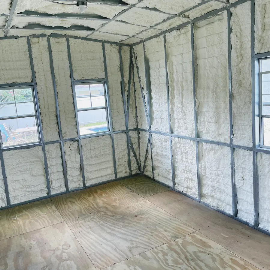 Closed-cell spray foam insulation applied to wall cavities in a residential project in Gardner